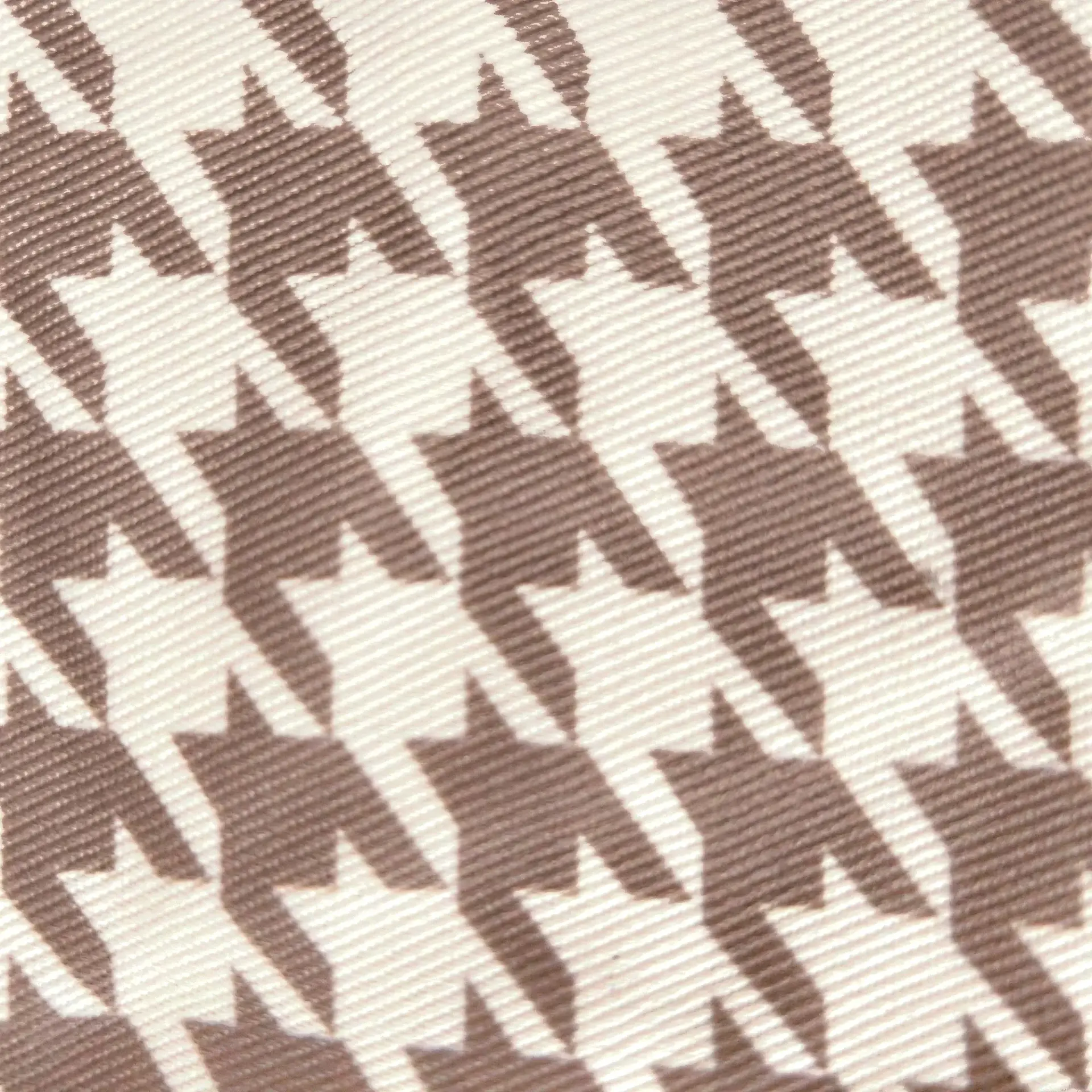 Tissu pied-de-poule beige et blanc du porte-bébé de hanche Billie & Bo, vu de près